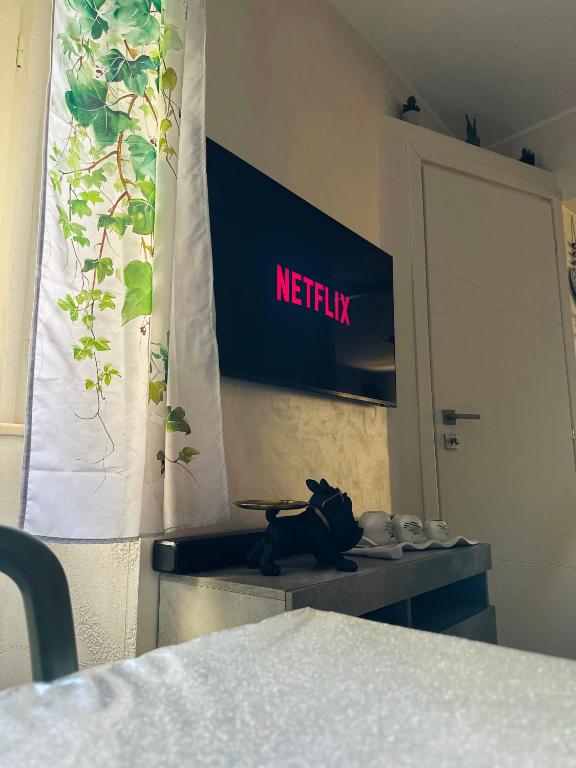 TV a/nebo společenská místnost v ubytování Il Rifugio Nel Vicolo