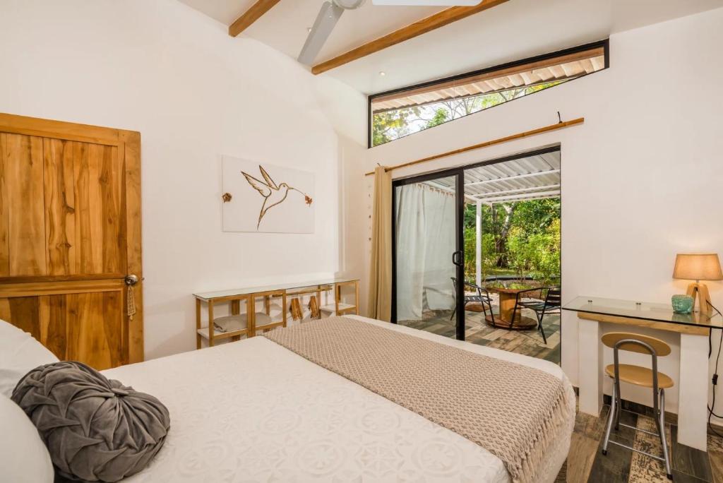 Postel nebo postele na pokoji v ubytování Casa de Valeria