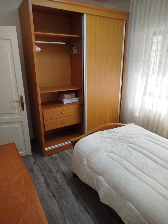Postel nebo postele na pokoji v ubytování Executive Apartments