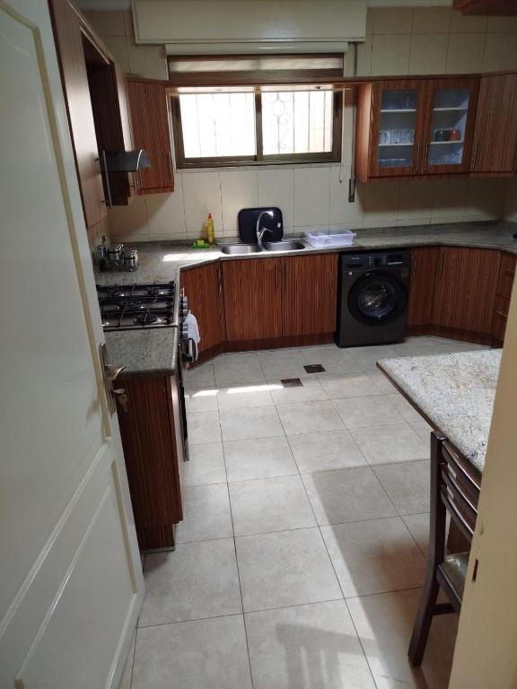 Kuchyň nebo kuchyňský kout v ubytování Executive Apartments