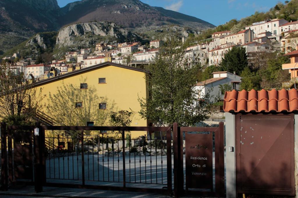 a view of a town from a fence at Residence Orto di Venanzio in Barrea