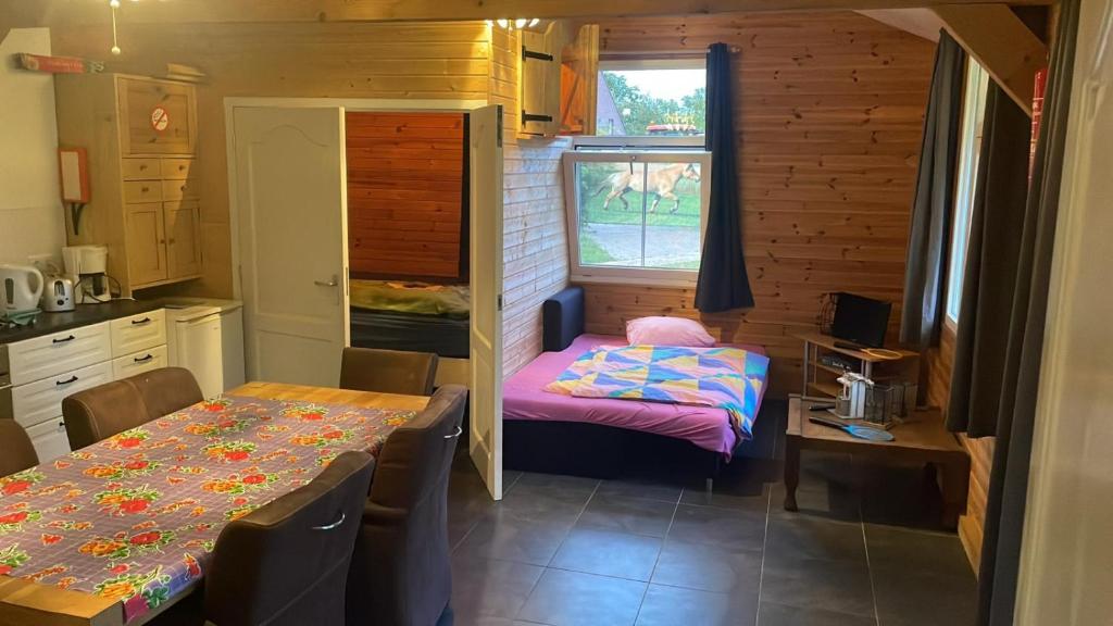 Postel nebo postele na pokoji v ubytování Hoeveheikant