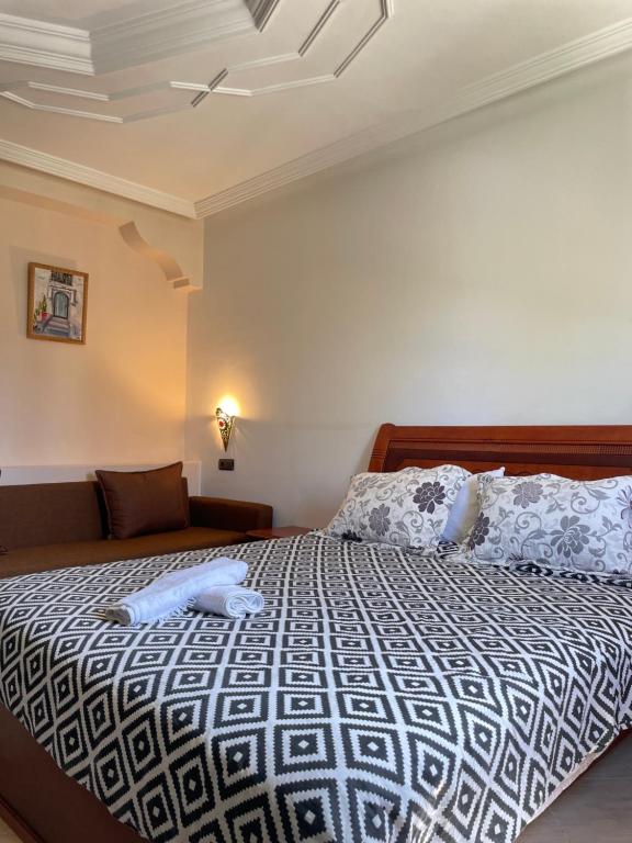 Letto o letti in una camera di Hotel Ryad Tetouan Aero