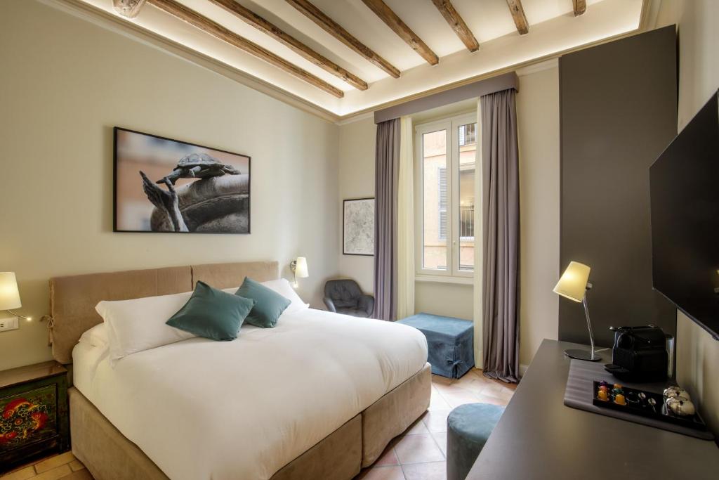 Postel nebo postele na pokoji v ubytování BeSecret Belsiana