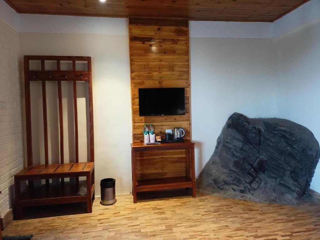 TV a/nebo společenská místnost v ubytování Delo Retreat