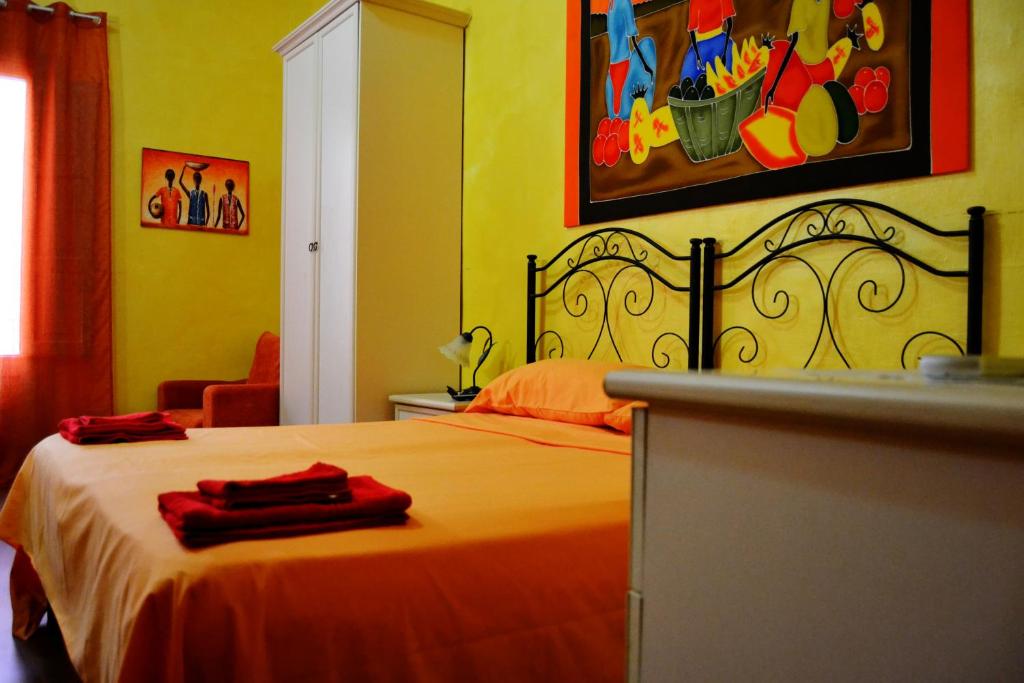 Postel nebo postele na pokoji v ubytování B&B La Corte Lecce