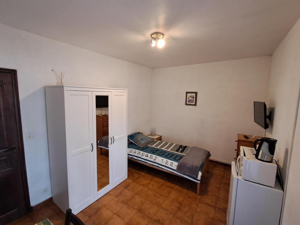Postel nebo postele na pokoji v ubytování Chambre SOLO Toulon Ouest