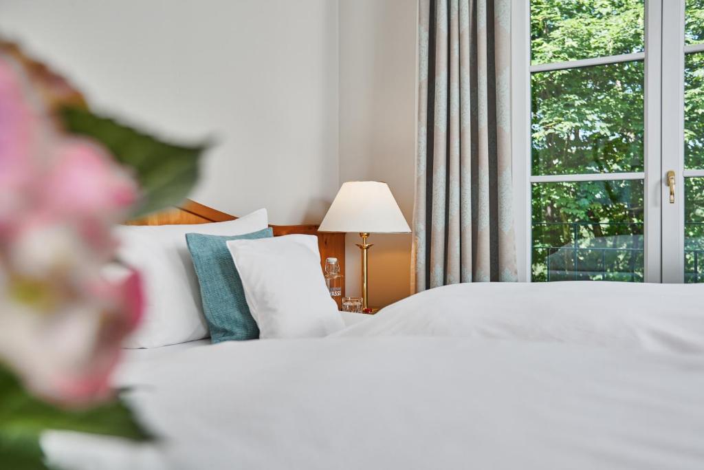 Postel nebo postele na pokoji v ubytování Hotel Freisinger Hof