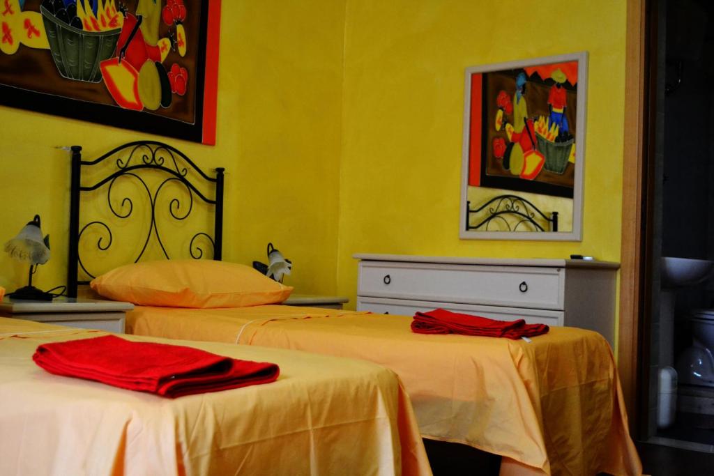 Postel nebo postele na pokoji v ubytování B&B La Corte Lecce