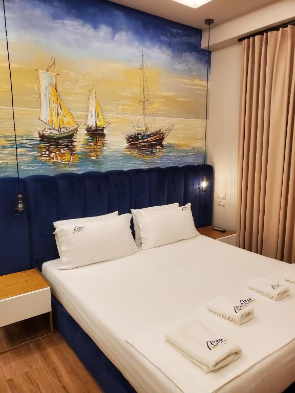 Postel nebo postele na pokoji v ubytování Area Hotel