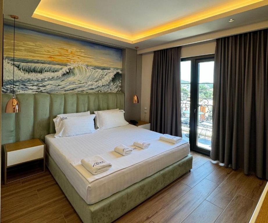 Postel nebo postele na pokoji v ubytování Area Hotel