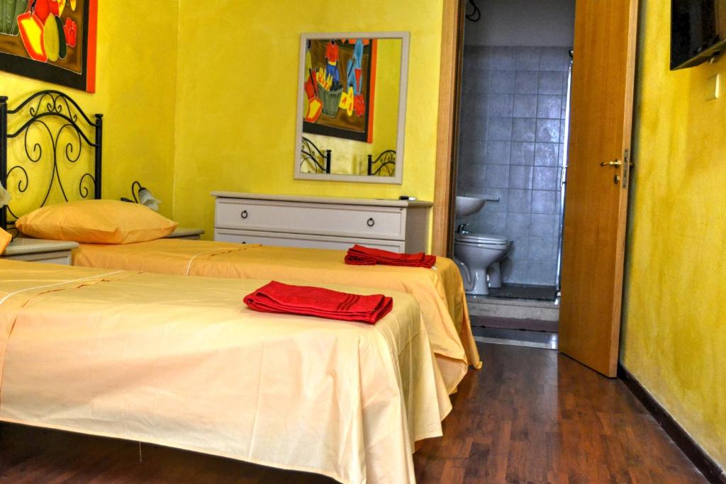 Postel nebo postele na pokoji v ubytování B&B La Corte Lecce