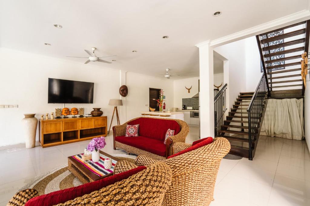 Uma televisão e/ou sistema de entretenimento em Sari Temuku Villa