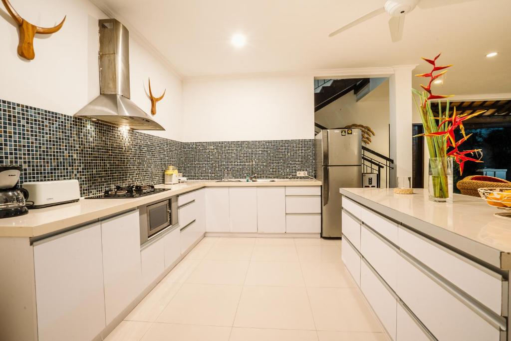 A cozinha ou kitchenette de Sari Temuku Villa
