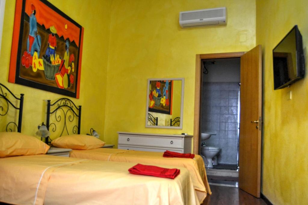 Postel nebo postele na pokoji v ubytování B&B La Corte Lecce