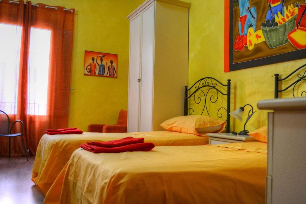 Postel nebo postele na pokoji v ubytování B&B La Corte Lecce