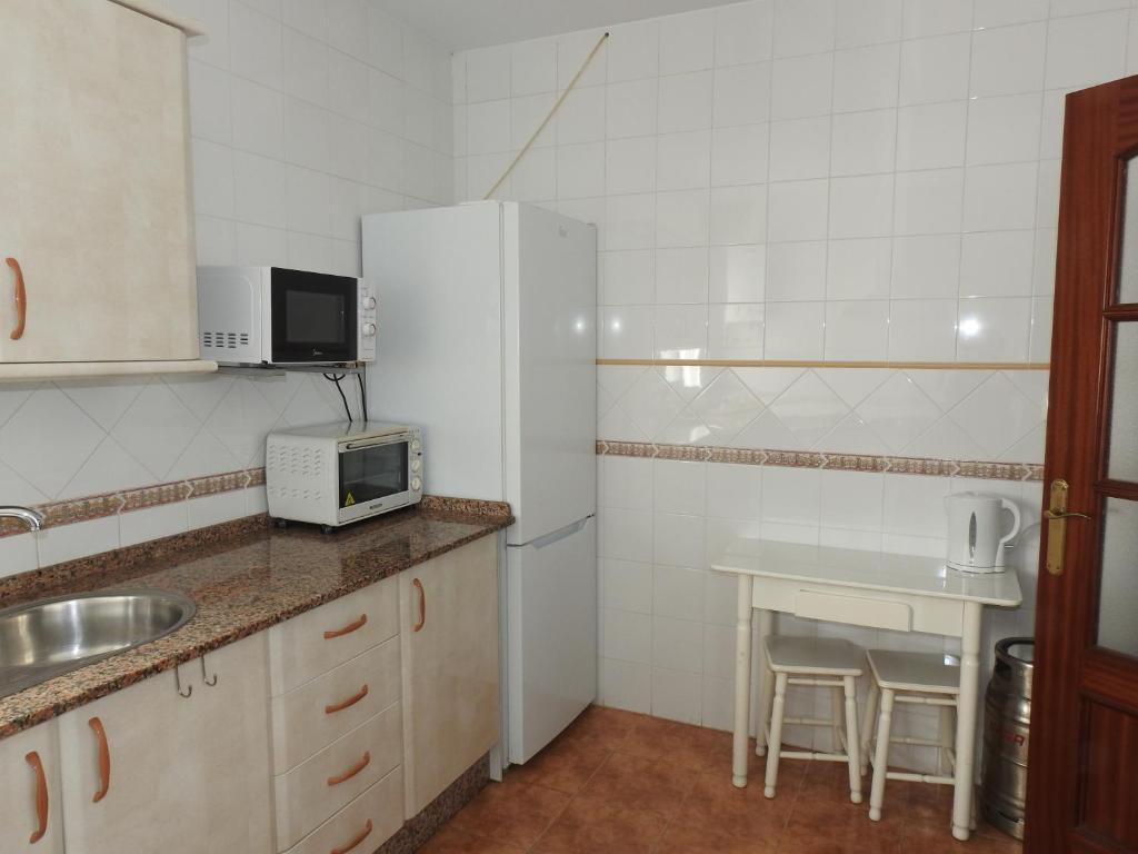 Kuchyňa alebo kuchynka v ubytovaní Glauka Apartamento tranquilo con Aire Acondicionado
