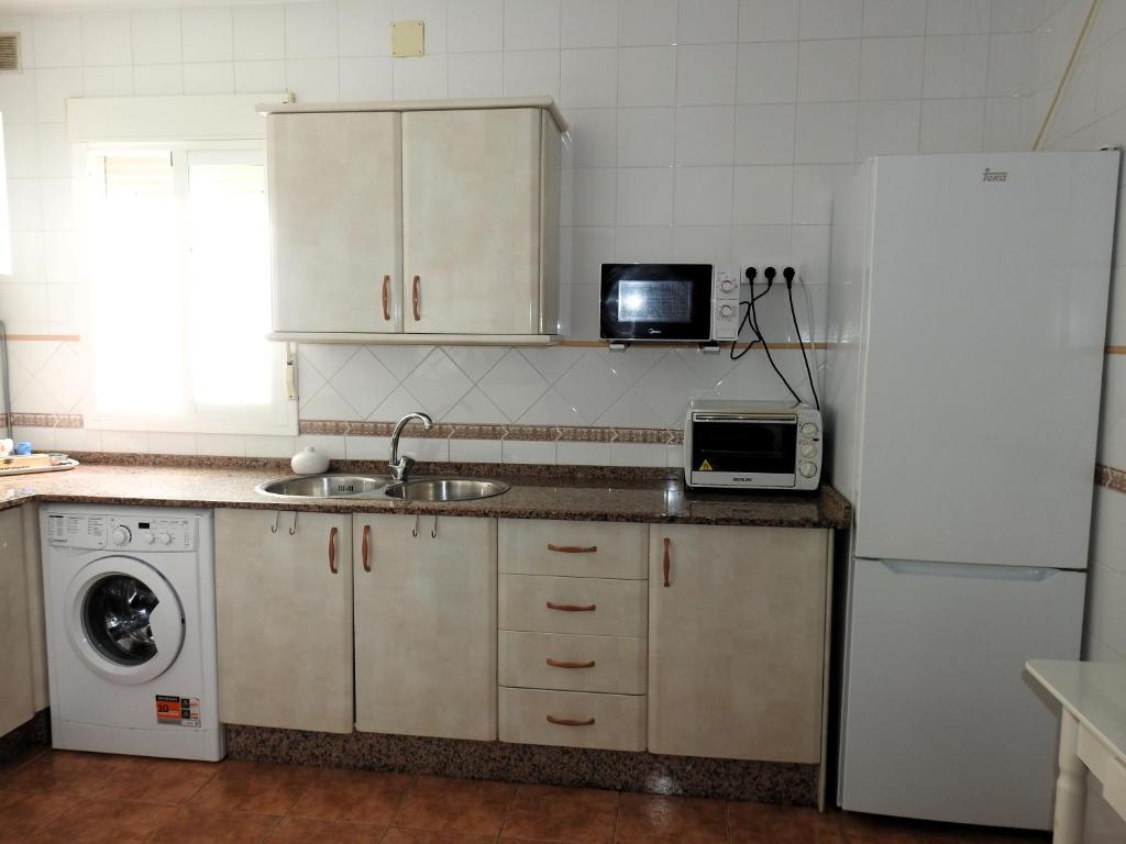 Kuchyňa alebo kuchynka v ubytovaní Glauka Apartamento tranquilo con Aire Acondicionado