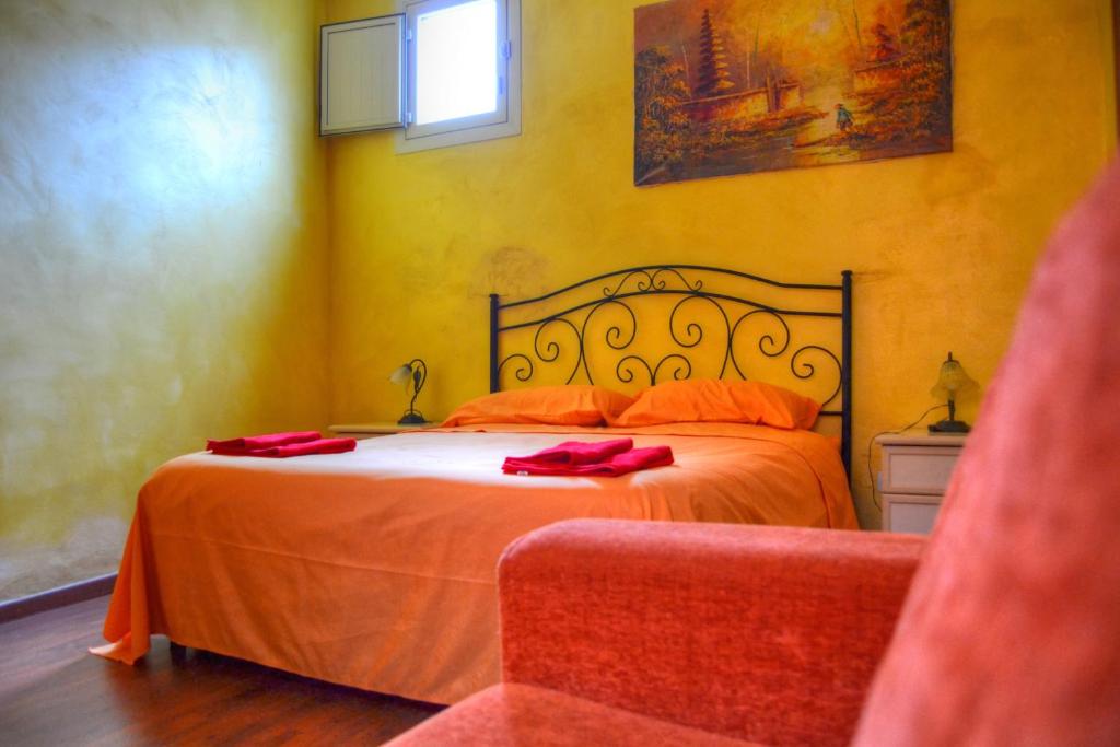 Postel nebo postele na pokoji v ubytování B&B La Corte Lecce