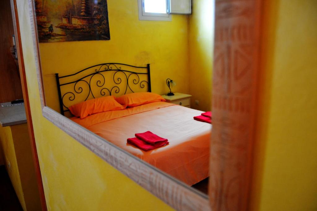 Postel nebo postele na pokoji v ubytování B&B La Corte Lecce