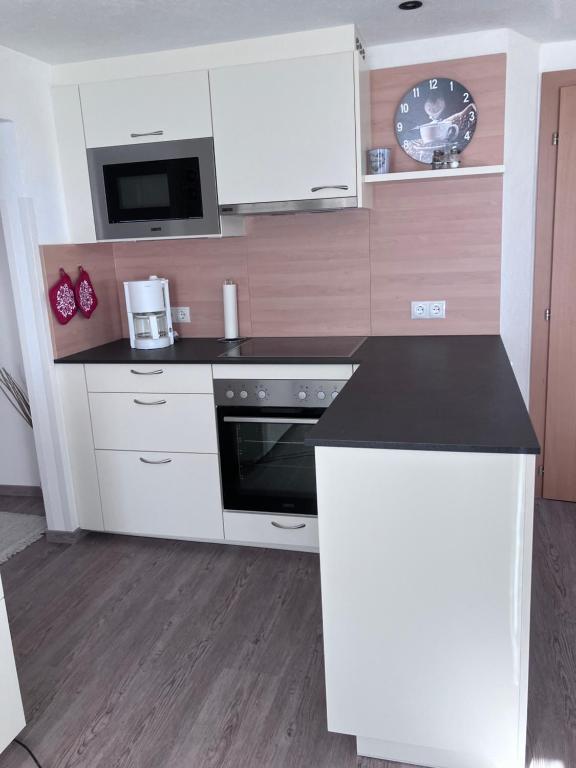 Kuchyň nebo kuchyňský kout v ubytování Haus Plankensteiner