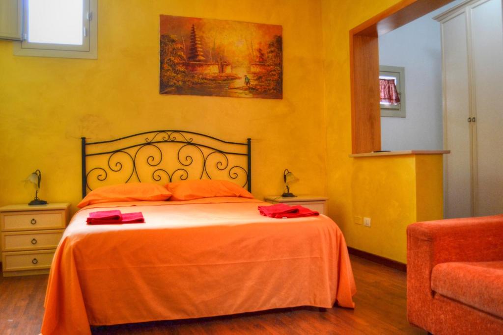 Postel nebo postele na pokoji v ubytování B&B La Corte Lecce