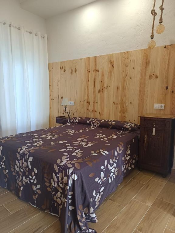 Postel nebo postele na pokoji v ubytování Apartamentos La Muralla