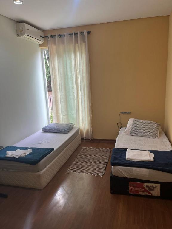 Postel nebo postele na pokoji v ubytování Pousada Vermont