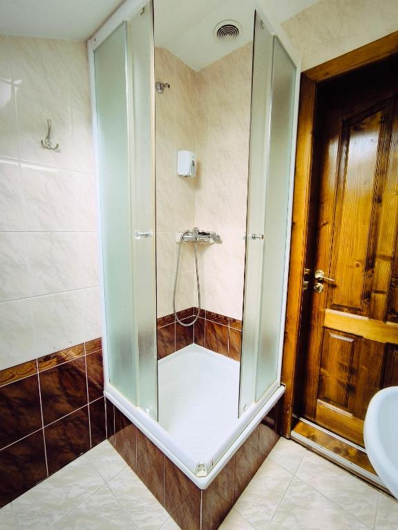 Koupelna v ubytování Hotel Delfin