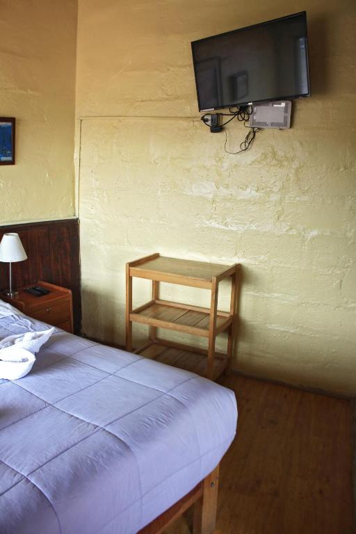 Televiisor ja/või meelelahutuskeskus majutusasutuses Samay Wasi Hostel I