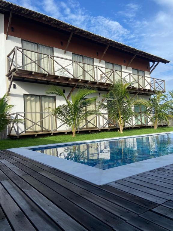 Bazén v ubytování Condomínio Aliete Mendes nebo v jeho okolí