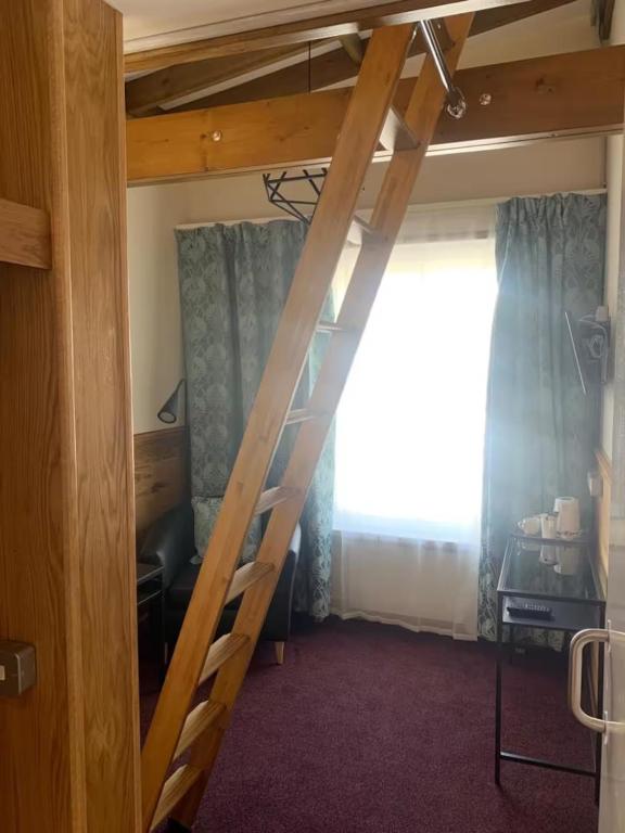 Postel nebo postele na pokoji v ubytování Hotel 22