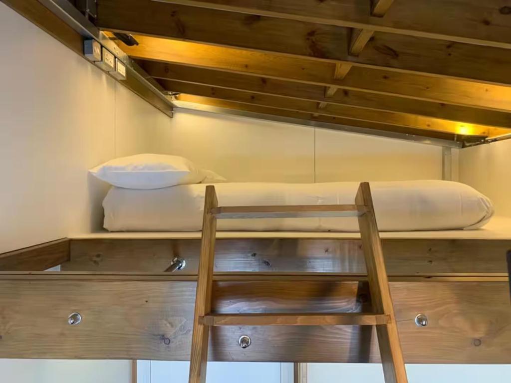 Postel nebo postele na pokoji v ubytování Hotel 22