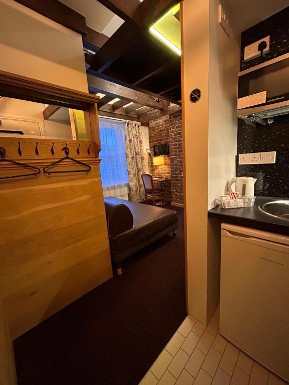 Kuchyň nebo kuchyňský kout v ubytování Hotel 22