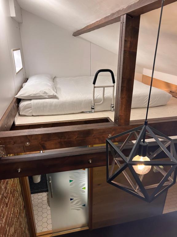 Postel nebo postele na pokoji v ubytování Hotel 22