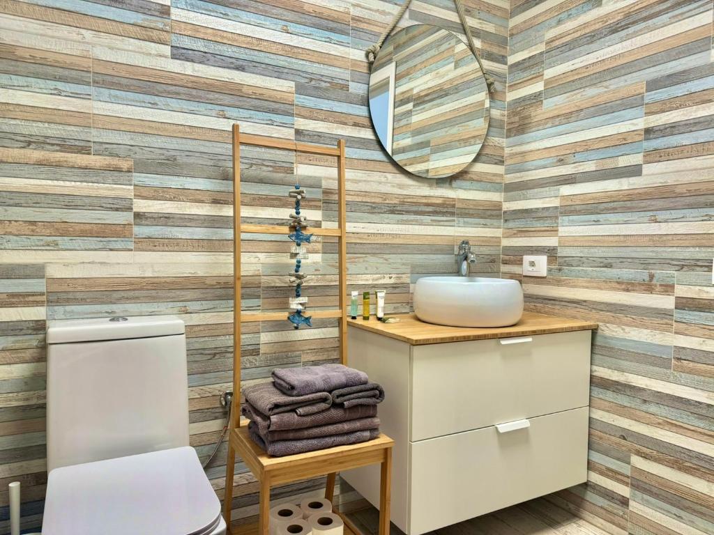A bathroom at Dominos Apartment with heated pool by SunHousesCanarias