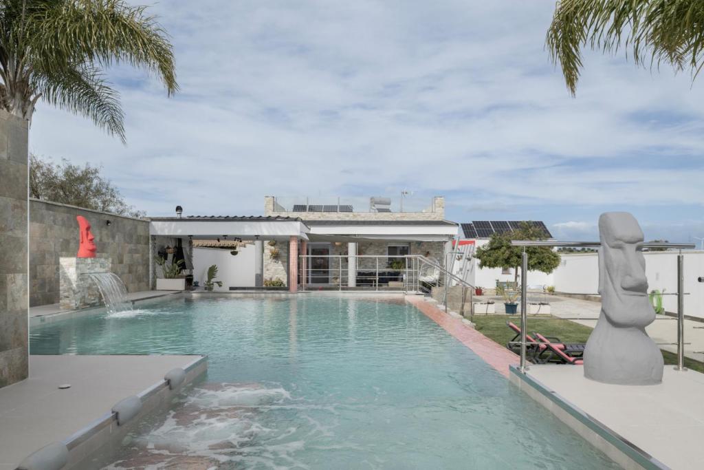Bazén v ubytování Villa Adán con piscina majestuosa nebo v jeho okolí