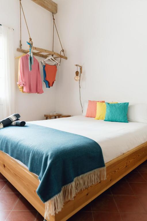 Postel nebo postele na pokoji v ubytování HoMe Hotel Menorca