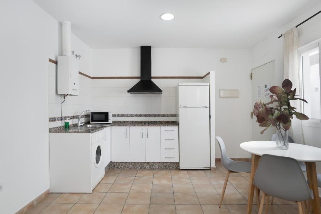 Kuchyňa alebo kuchynka v ubytovaní Apartamento Perez Zara 3
