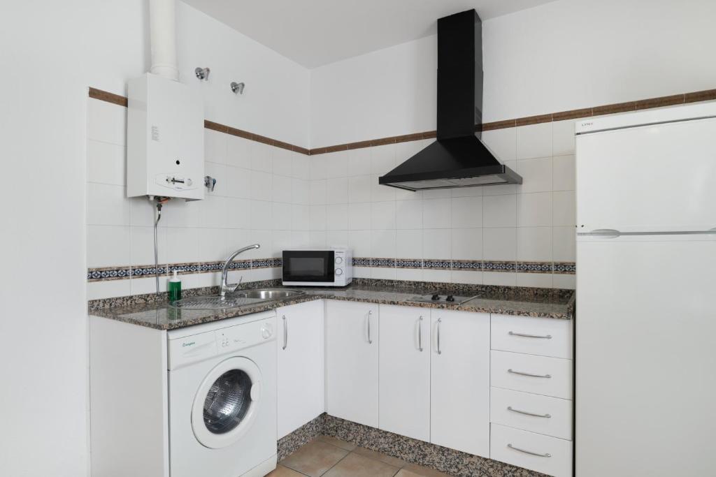 Kuchyňa alebo kuchynka v ubytovaní Apartamento Perez Zara 3