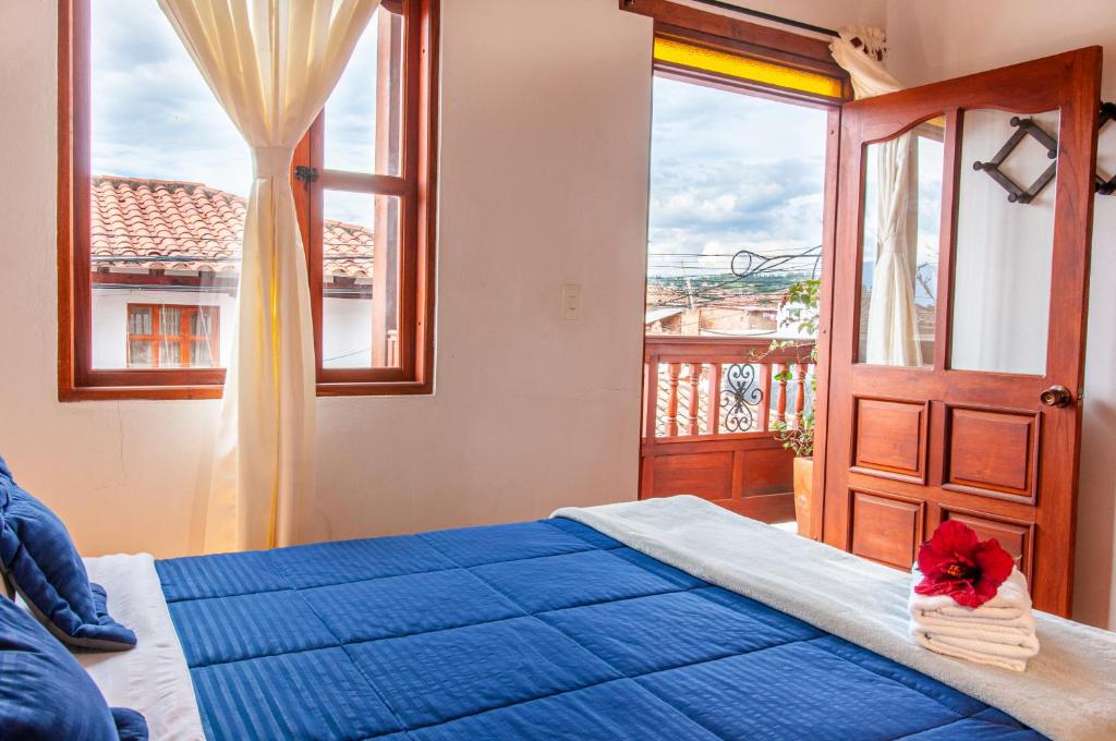 Cama o camas de una habitación en HOTEL RUTA 40 VILLA DE LEYVA