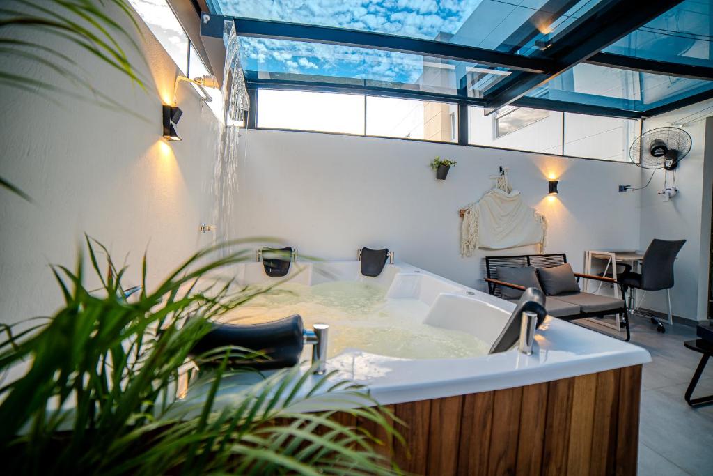 Posezení v ubytování Espectacular Casa de Ensueño "Jacuzzi Privado" en Ricaurte - Peñalisa