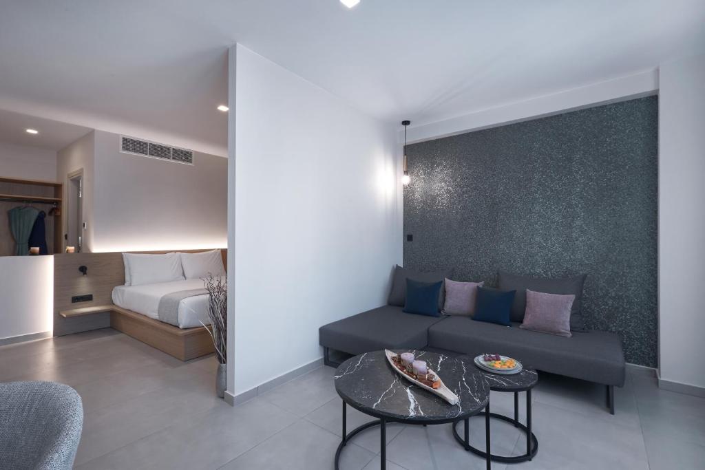Postel nebo postele na pokoji v ubytování Athens City Suites