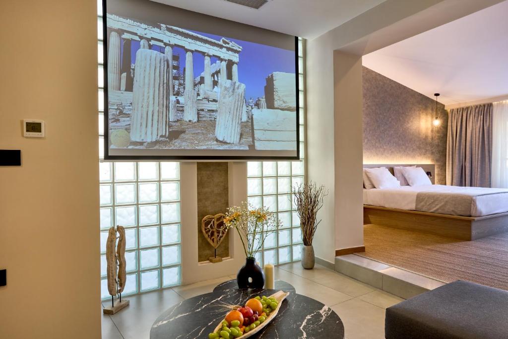 TV a/nebo společenská místnost v ubytování Athens City Suites