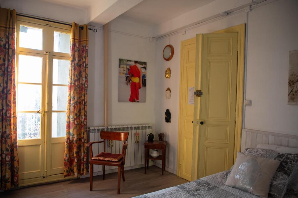 Postel nebo postele na pokoji v ubytování Mas de Bellegou