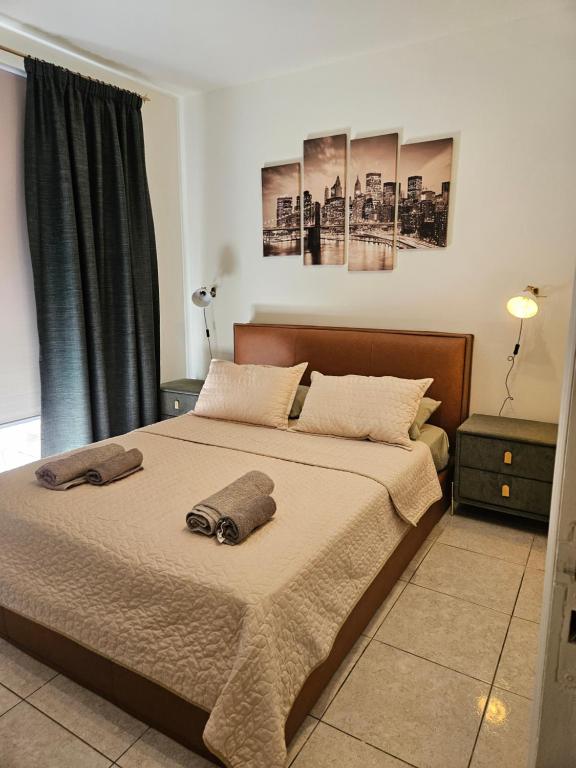 Postel nebo postele na pokoji v ubytování ROOMS by Emmelia Group
