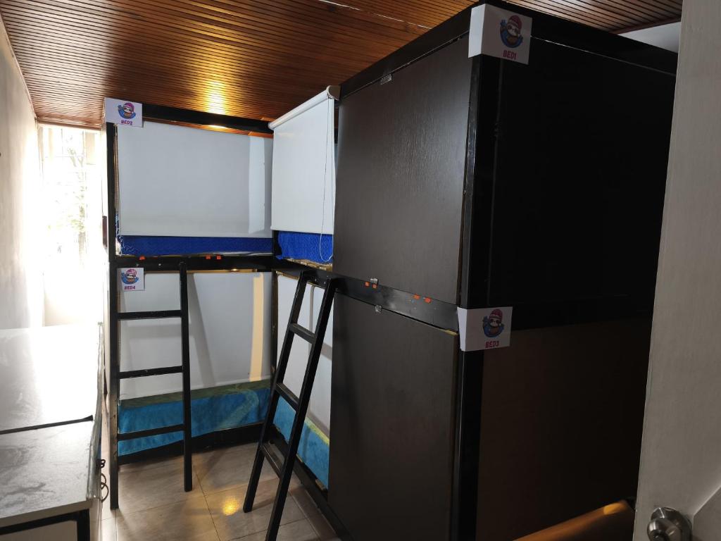 Palanda nebo palandy na pokoji v ubytování Ayllu Hostel