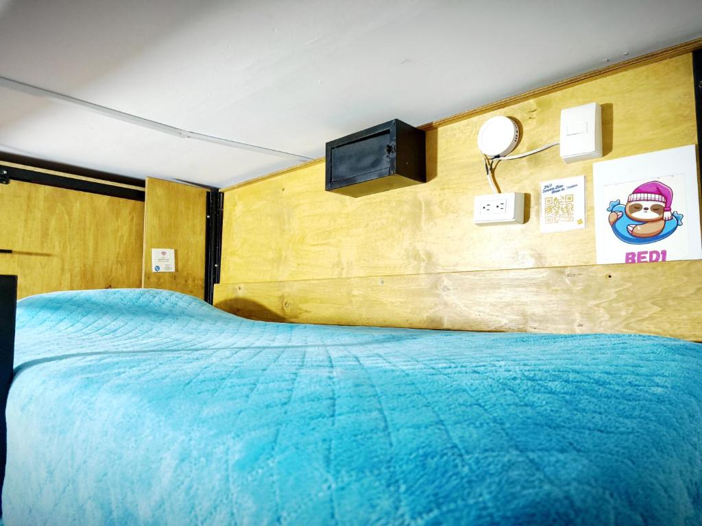 TV a/nebo společenská místnost v ubytování Ayllu Hostel