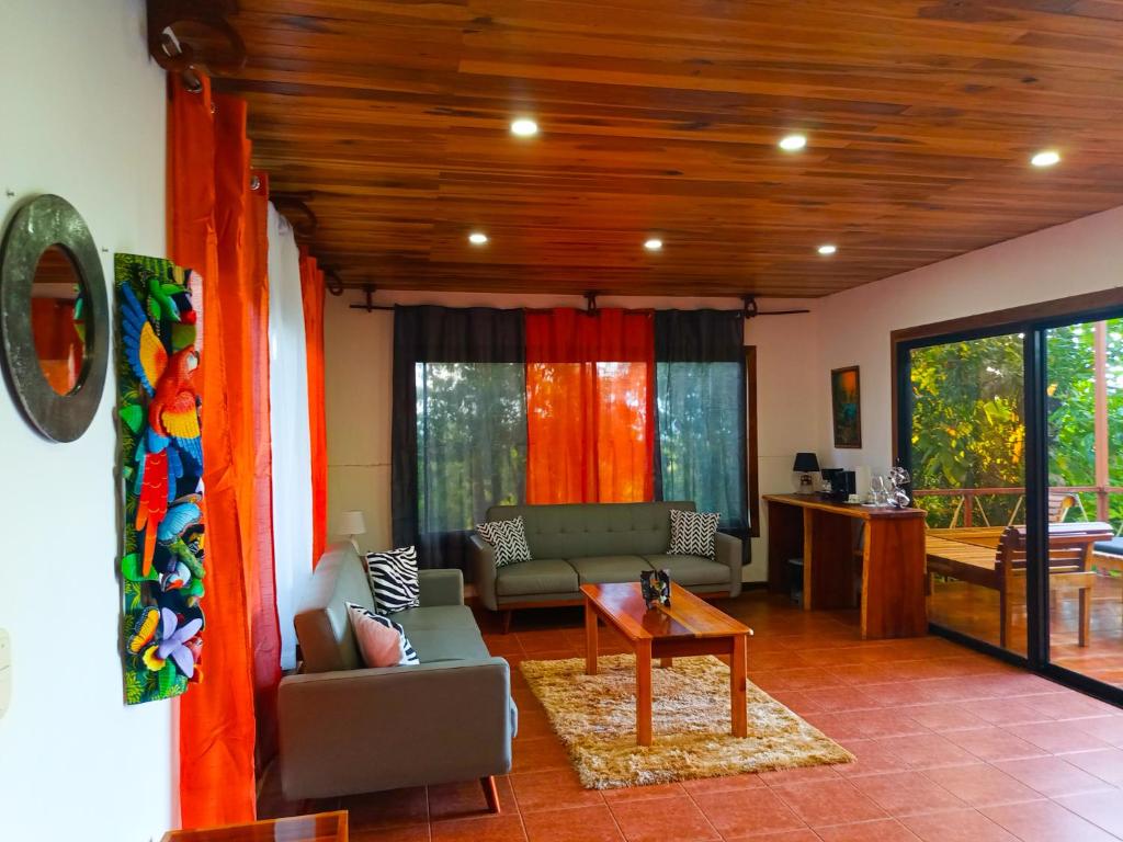 Posezení v ubytování Corcovado Private Houses-Villas-Tents-pool-rest