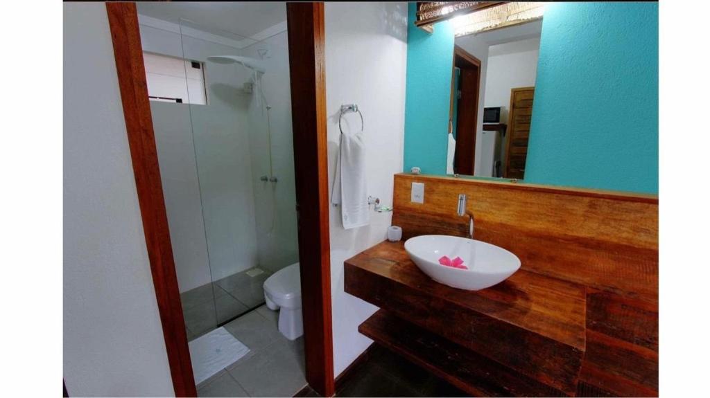 Um banheiro em Pousada Arágua